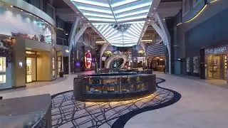 Wonder of the Seas Walk through on the Royal Promenade with Passengers Kevin and Susan Bedford