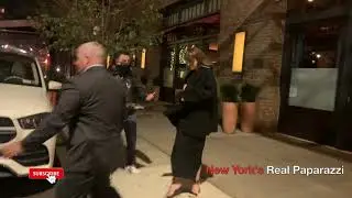 Dakota Johnson spotted all bundle up while leaving her hotel.