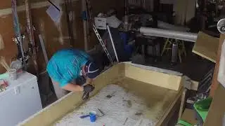 Laying Fiberglass for SUV pop top conversion.