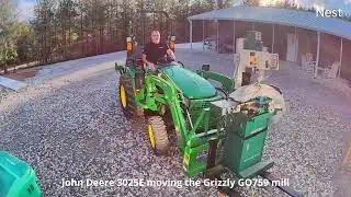 John Deere 3025E moving the Grizzly GO759 mill to the new building