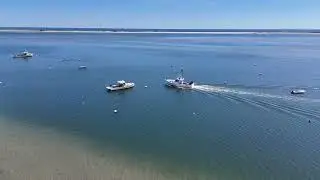 Commercial Fishing Boat Aerial at Chatham, Cape Cod : stock footage #456b