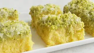 Delicious Coconut Cake with a Pistachio cream twist! Melts in your mouth - One-Bowl Recipe