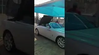 Robert Mugabe's son and his New Bentley.