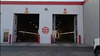 Double auto in-swing red and white with windows