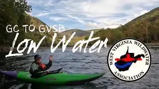 New River kayaking on low water in early fall. Beautiful autumn colors