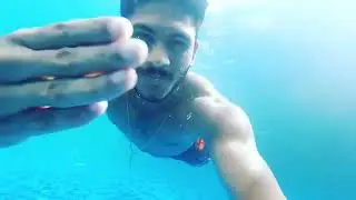 Indian Cricketer Basil Thampy underwater swimming