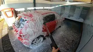 pov throwing water at a car