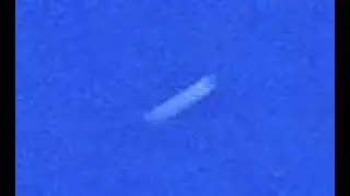 white rod ufo photographed over north Texas - 3/31/2021 - UFOsAboveUs