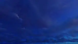 ( CGI 4k Stock Footage ) Dark blue night clouds on stary sky time lapse seamless loop