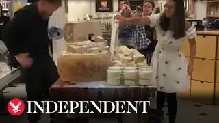 Animal Rebellion protesters pour milk over high-end London department stores