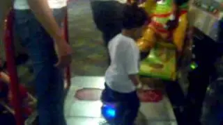 Baby Girl playing DDR