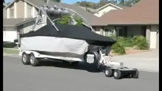 TitanX4 Trailer Mover Demo pulling 6,500lb GVWR boat on dual axel trailer