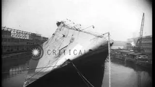 SS Normandie lay on her side in the dock HD Stock Footage