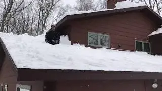 Joe Slides Off Roof On A Snow Shovel. Mercer, WI - Feb. 2019