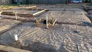 Foundation Moisture Barrier Plastic, Welded Wire Reinforcement (WWR), and Rebar Footings Installed