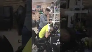 Angry barber slaps