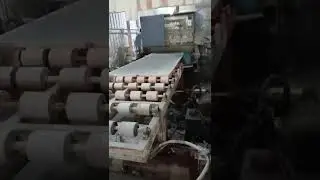 Stone slab processing production line, continuous calibration machine