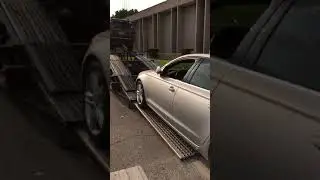 Open car transport, car shipping, long distance vehicle shipping, loading