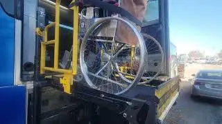 Securing a wheelchair in an MCI bus