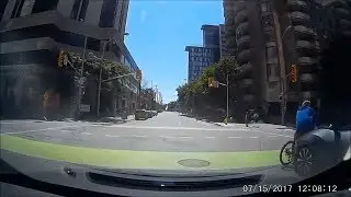 Dashcam Footage Captures Ottawa Cyclist Being Struck by Car