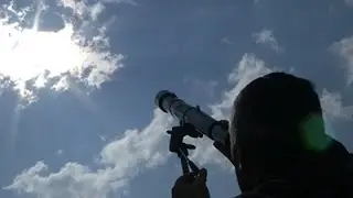 Raw: Sky-gazers Treated to Solar Eclipse