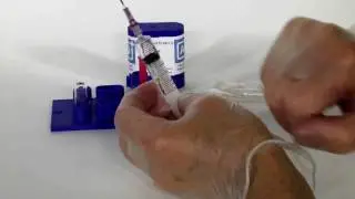 Ampoule Opener: Needle stick prevention using AO+ safety ampoule opener.