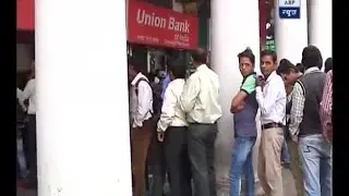 Some ATMs in Delhi start working; people queue up