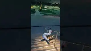 Woman is trying to slide down a handrail, and it doesn't go well!