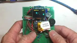 Billy's Arduboy game console clone on breadboard.