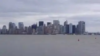 Skyline New York City Manhattan Financial District and Ellis Island National monument.