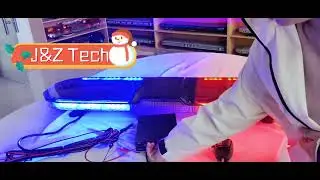 A police lightbar with black siren amplifier.#iPhone17