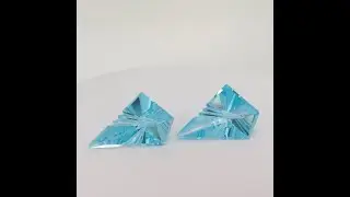 A pair of  Fantasy cut Blue Topaz gemstones (9.1ct and 8.6ct)
