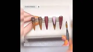 Acrylic Nail Design Redish/Brown With Brown And Gold Glitter