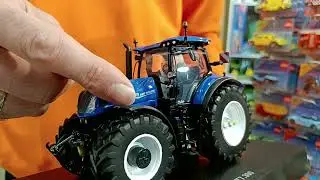 Universal Hobbies 6604 - New Holland T7.300 AC 1:32