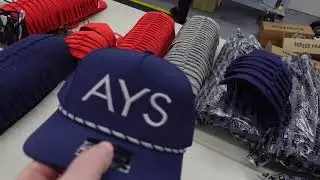 Contract Embroidery Shop Pumping out hats on Barudan Embroidery Machines.