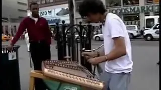 New York City Street Musician In Union Square - What Instrument Is He Playing???