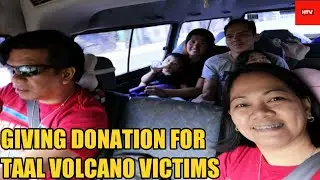 GIVING DONATION FOR TAAL VOLCANO VICTIMS