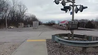 BNSF 3869 lead Empty Tank/ EBG hopper bay grain cars at LA Plata ,  MO .