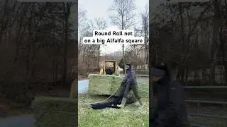 Trying a Haychix Round roll net on a giant square bale