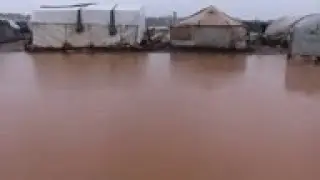 Displaced Syrians struggle amid cold, wet weather