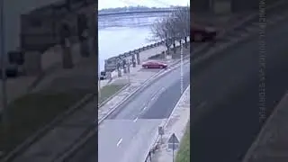 WATCH: Unoccupied car goes through traffic, plunges into river | #shorts