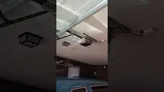 Garage door opening and closing, but with a safety sensor test