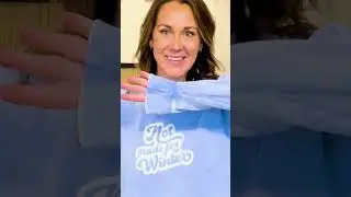 Jennifer stands out in a blue sweater with 
