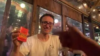 Kyle Dunnigan opens Rocky II cards (Sly Stallone) Kill Tony walks by