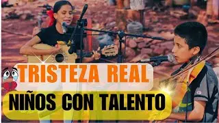 Ni&ntilde;os tocando, triste es mi vida - Manuel Cruz