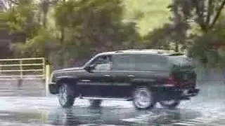 Escalade Having Fun On Wet pavement