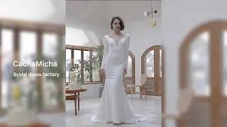 A royalty long sleeve crepe wedding dress with unique cut out lace design