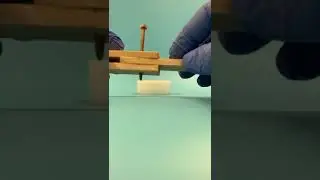 Hammering Together Three Boards With a Hardened Wood Nail