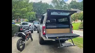 F250 DIY truck camping contactor cap setup made with old shelving and scrap wood