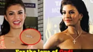 Jacqueline sports a cross after break up
